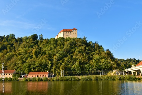 View of Rajhenburg castle on a hill above Sava river near Krško in Dolenjska, Slovenia photo