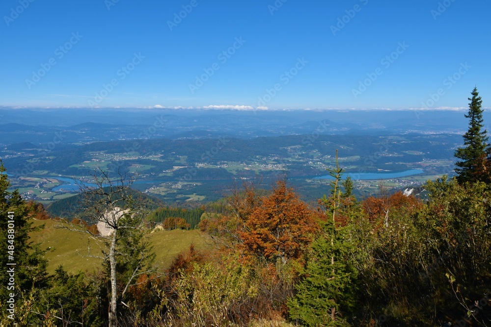 Austrian region of Carithia with snow mountain peaks in the alps from Karavanke mountains in autumn
