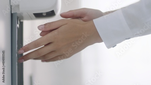 Close up using automatic hand dispenser