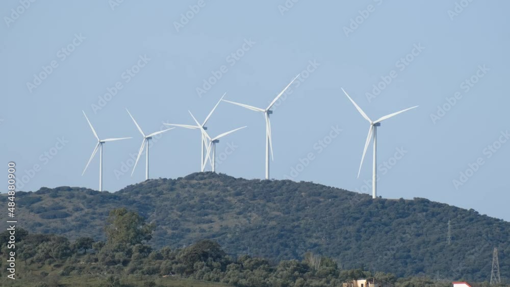 Wind turbines on beautiful cloudy day mountain landsape. Wind turbines on beautiful cloudy day mountain landsape.