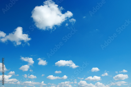 Bright blue sky with light clouds.