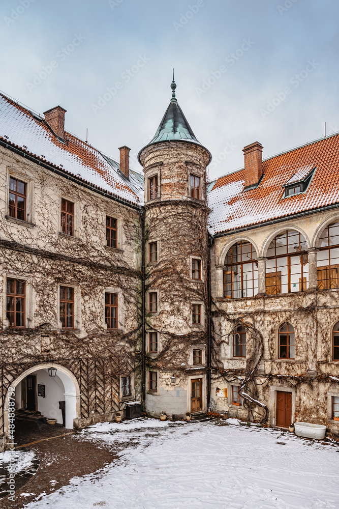 Hruba Skala,Czech Republic.Courtyard of Renaissance chateau located on sandstone bedrock in Cesky raj,Bohemian Paradise,winter view.At present castle is used as hotel.Protected landscape area.