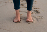 Bare feet on the sand