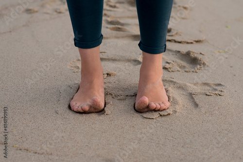 Bare feet on the sand