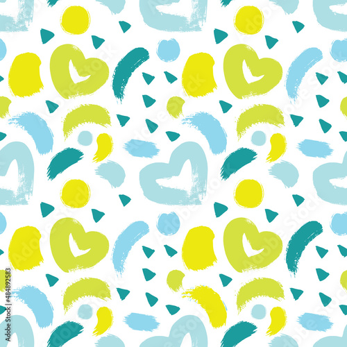 Seamless pattern with hearts in yellow and blue colors. Dry brush.