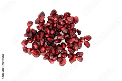 Foto seeds of a pomegranate isolated on white background
