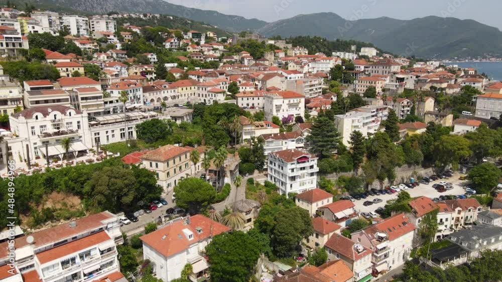 Aerial View of Herceg Novi, Montenegro. Cityscape Buildings on Hills Above Adriatic Sea, Drone Shot Aerial View of Herceg Novi, Montenegro. Cityscape Buildings on Hills Above Adriatic Sea, Drone Shot