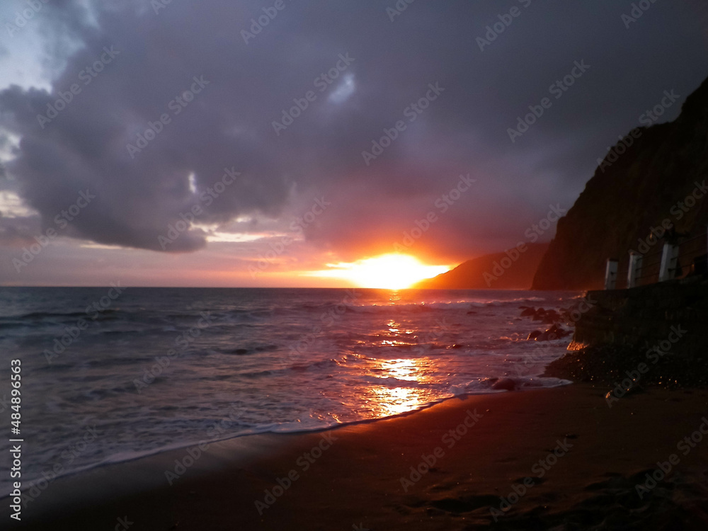 Beautiful sunset over Povoa??o beach, Azores Islands.