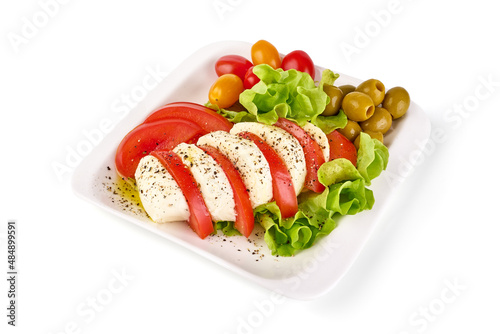 Caprese salad, isolated on white background.