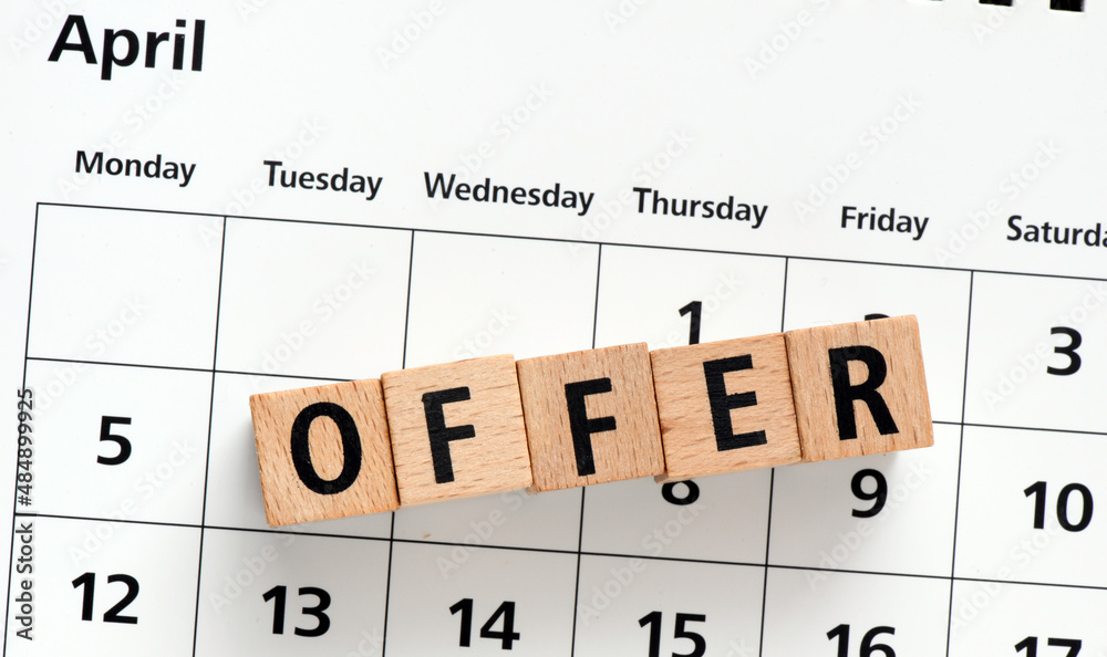 OFFER word from wooden letters in the calendar. OFFER word from wooden letters in the calendar.