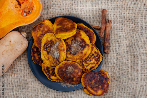 Fototapete Traditional South African pumpkin fritters or pancakes known as Pampoenkoekies