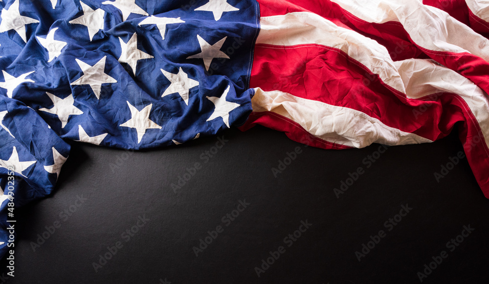Happy presidents day concept with flag of the United States on dark background. Happy presidents day concept with flag of the United States on dark background.