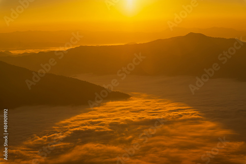 Landscape of the mountain and sea of mist in winter gold sunrise view from top of Phu Chi Dao mountain , Chiang Rai, Thailand