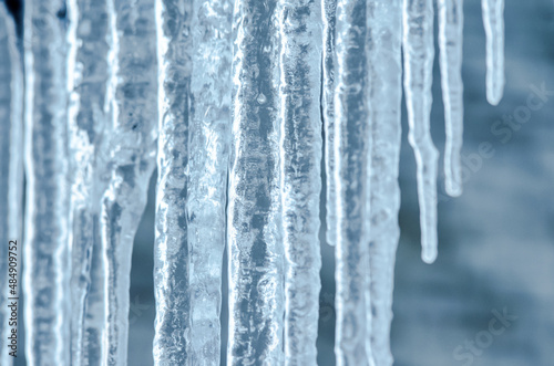 Background of bright transparent icicles