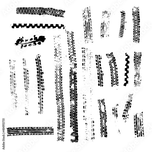 Traces from the tire tread of a car, motorcycle or bicycle. Motocross, rally, track, traces of grungy wheels. Vector texture.