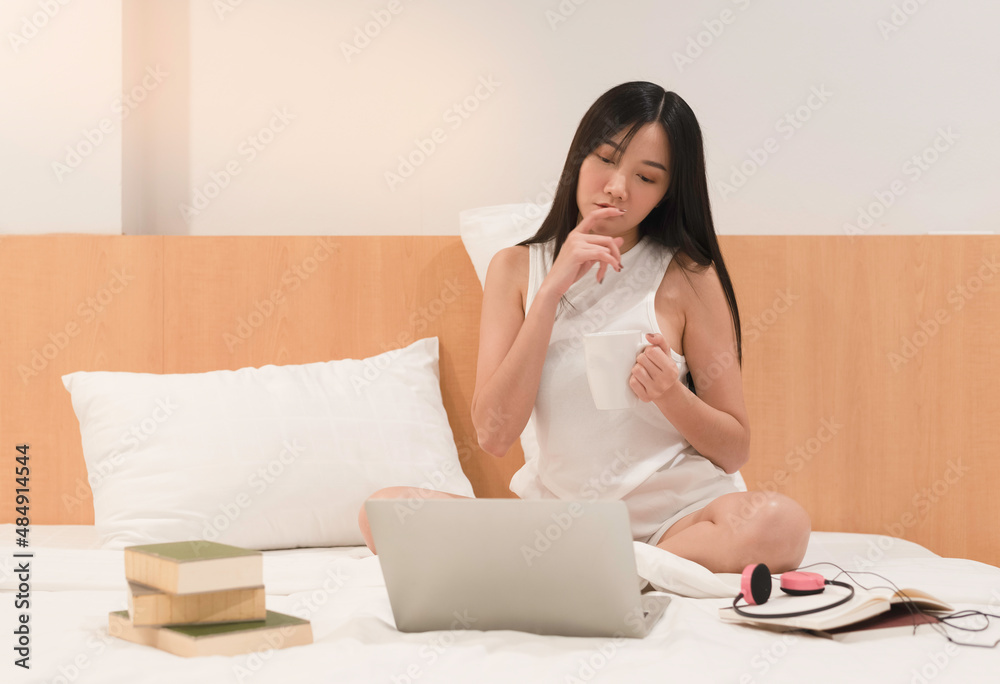 Beautiful woman doing activity in bed Beautiful woman doing activity in bed
