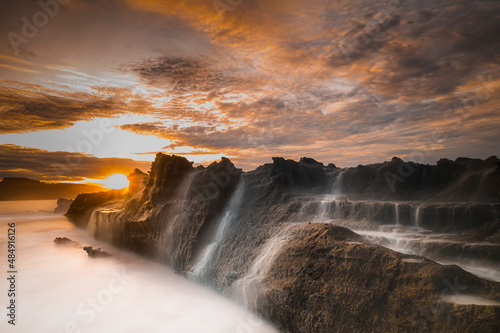 Beautiful sky and wave flow on the beach
