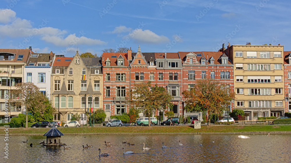 Obraz premium Row of houses in eclectic art nouveau style on the embankment of Ixelles lakes, Brussels, Belgium