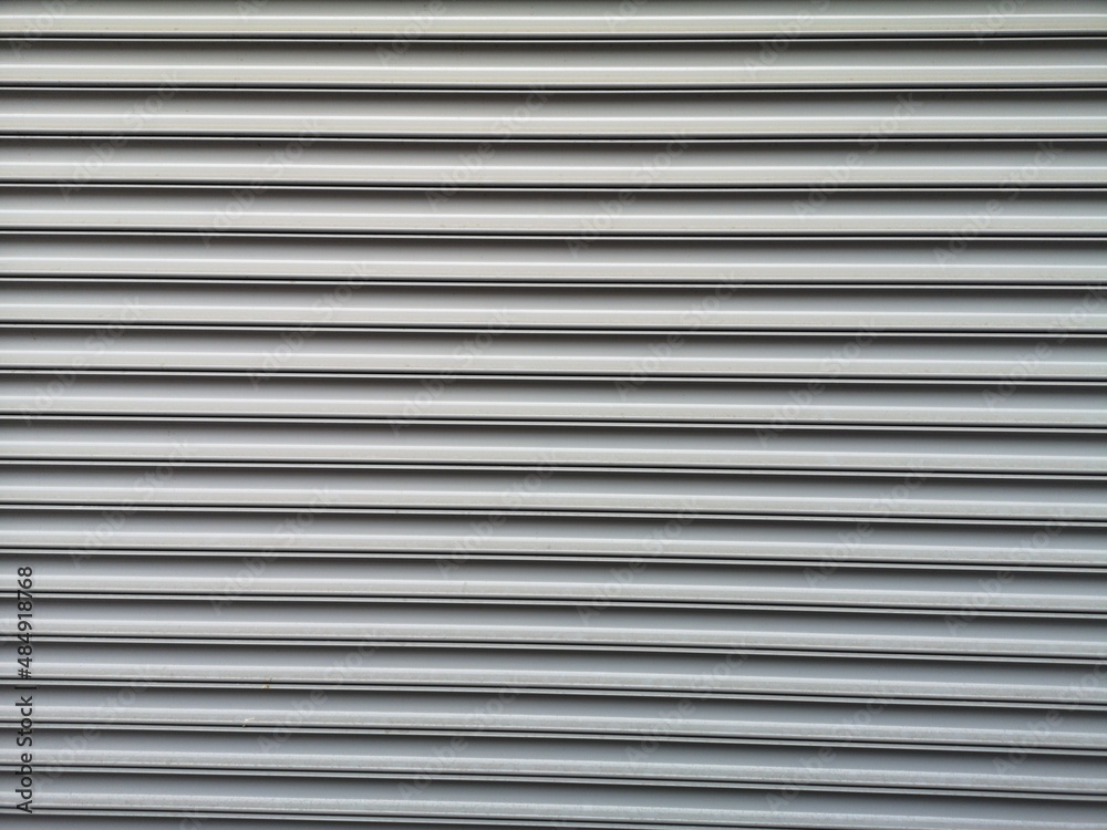 old metal shutters of a store old metal shutters of a store