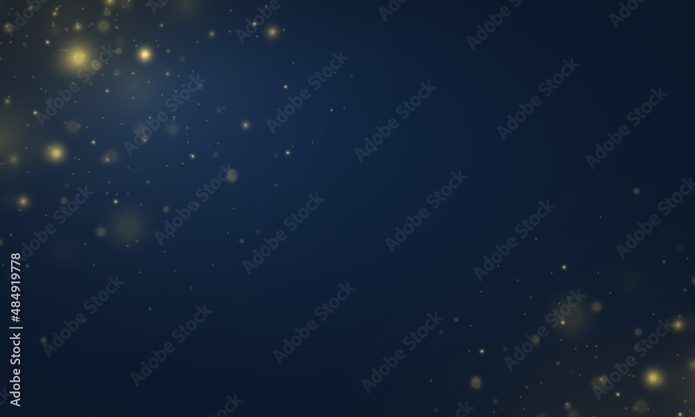 Golden blurred bokeh light on dark blue background