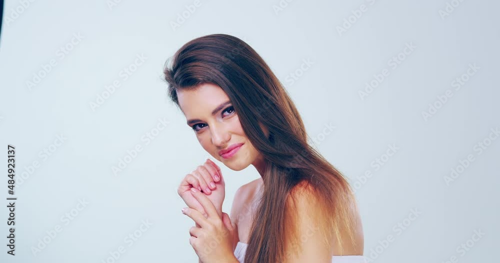 Feeling fantastic with my fabulous hair. 4k video footage of a beautiful young woman with gorgeous hair posing in the studio. Feeling fantastic with my fabulous hair. 4k video footage of a beautiful young woman with gorgeous hair posing in the studio.