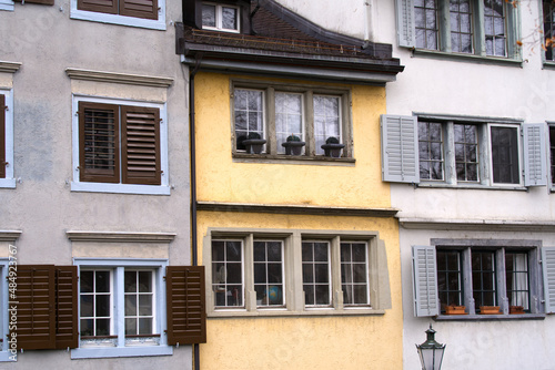 Close-up of beautiful colorful facades of historic houses at medieval old town of Zürich on a winter day. Photo taken February 1st, 2022, Zurich, Switzerland.