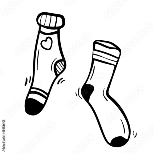 A pair of different socks vector illustration in hand drawn doodle style