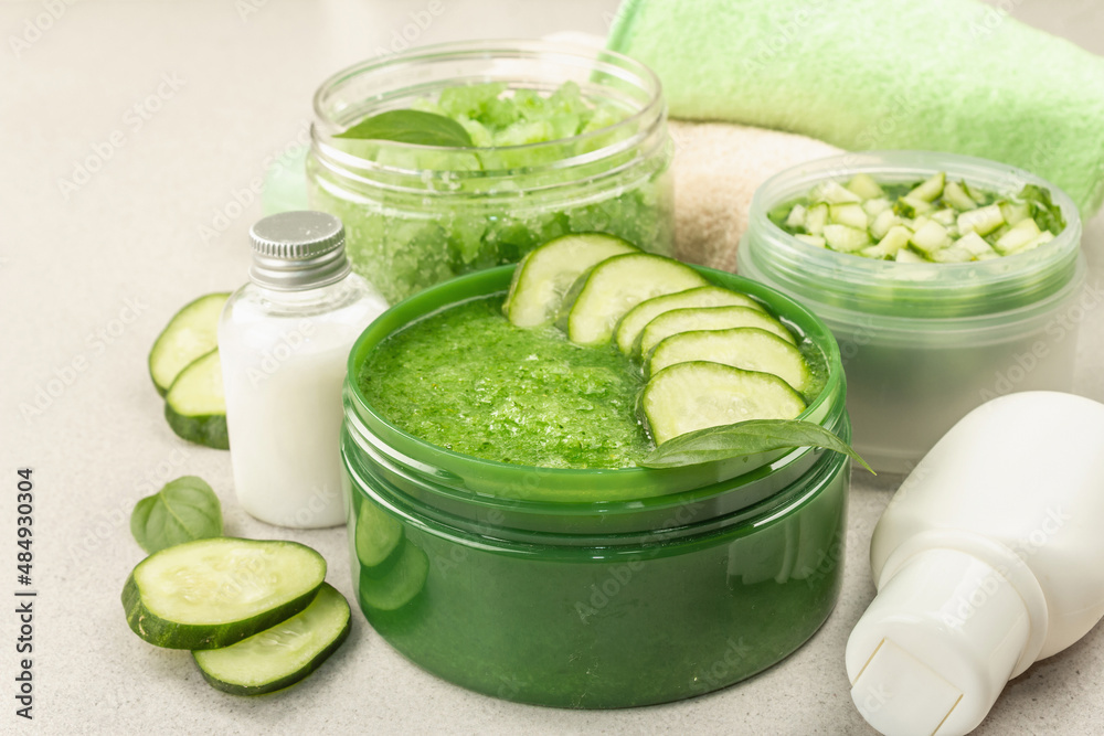 Homemade cosmetics with cucumber. Natural cream, sea salt, body lotion, and soap