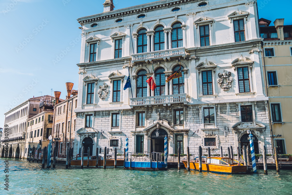 Naklejka premium Italian landscape of ancient buildings for visiting during summer vacations and exploring European scenery, historical architecture located near Grand Canal waters in Venice - romantic city