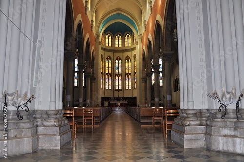 Central altar and stained glass windows in the background of the Capuchin Church of Our Lady of Lourdes in Rijeka.The church is a unique example of eclecticism in Rijeka.