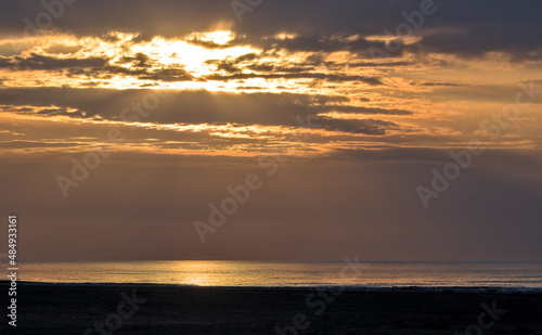Sunrise on a foggy morning on the Black Sea coast.