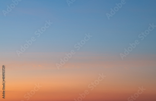 Sky gradient from blue to orange sunset © EKKAPON