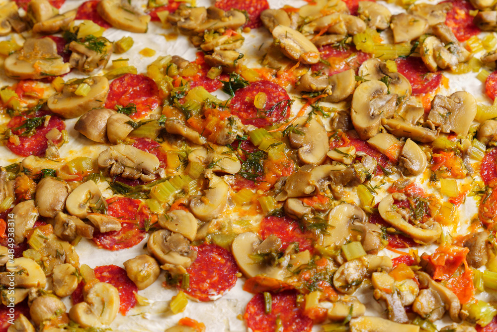 Pizza ingredients, vegetables with mushrooms and spices close-up. Food background Pizza ingredients, vegetables with mushrooms and spices close-up. Food background