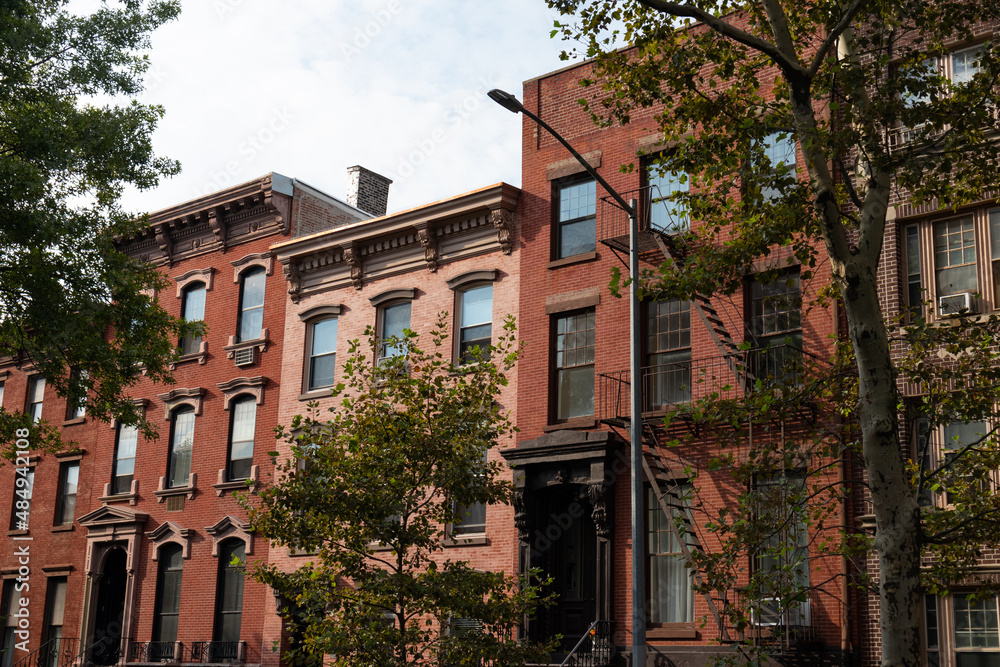Fototapeta premium Row of Colorful Old Brick Residential Buildings in Greenpoint Brooklyn of New York City