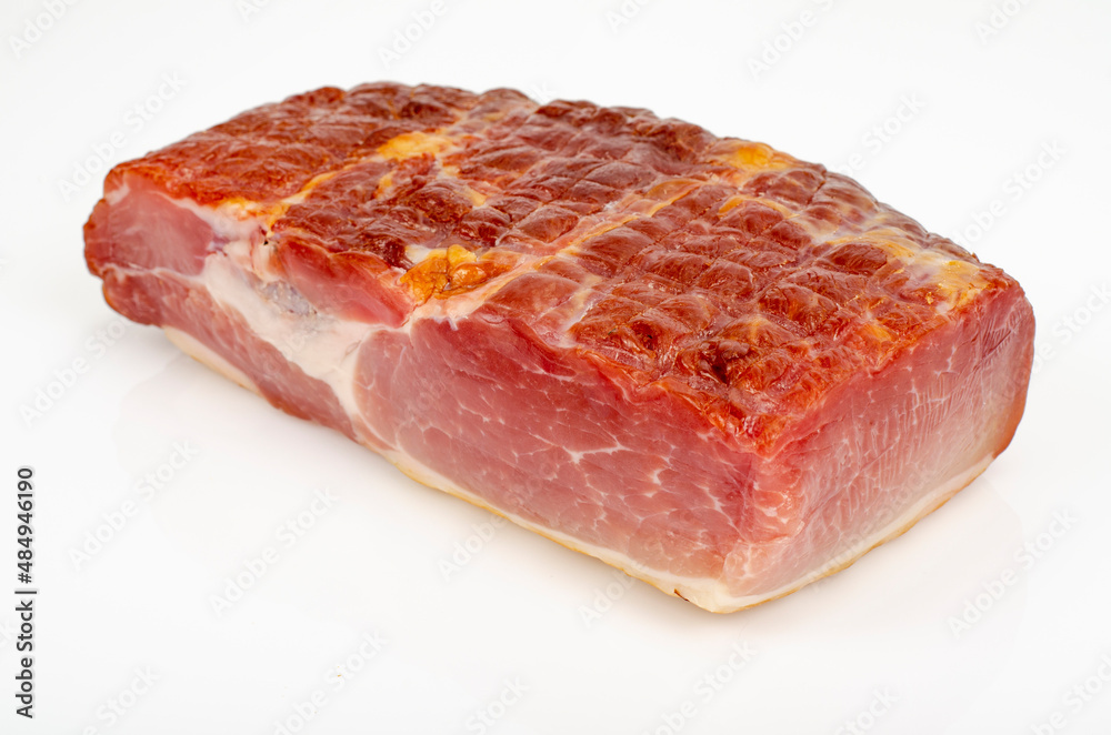 Piece of raw smoked pork ham on white background. Studio Photo
