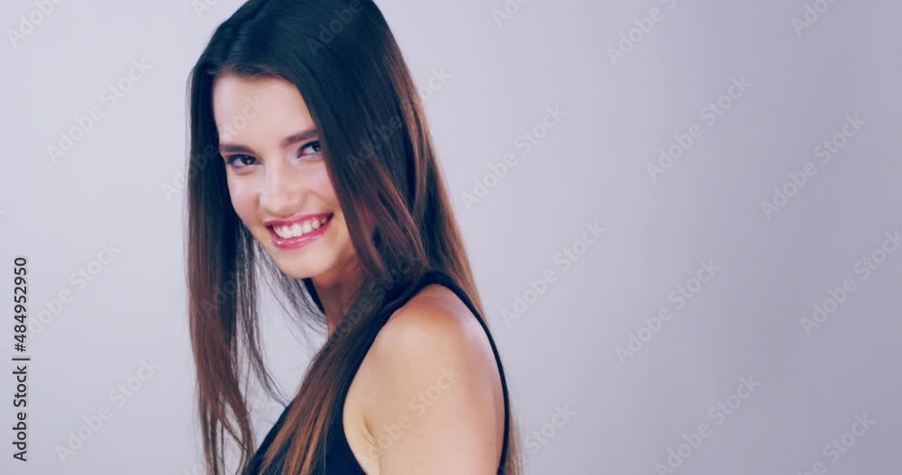 Thumbs up to looking after your skin. 4k video footage of a beautiful young woman with gorgeous hair showing thumbs up in the studio. Thumbs up to looking after your skin. 4k video footage of a beautiful young woman with gorgeous hair showing thumbs up in the studio.
