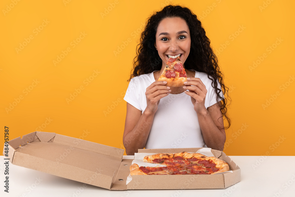 Happy Latin Lady Biting Pizza At Studio Happy Latin Lady Biting Pizza At Studio