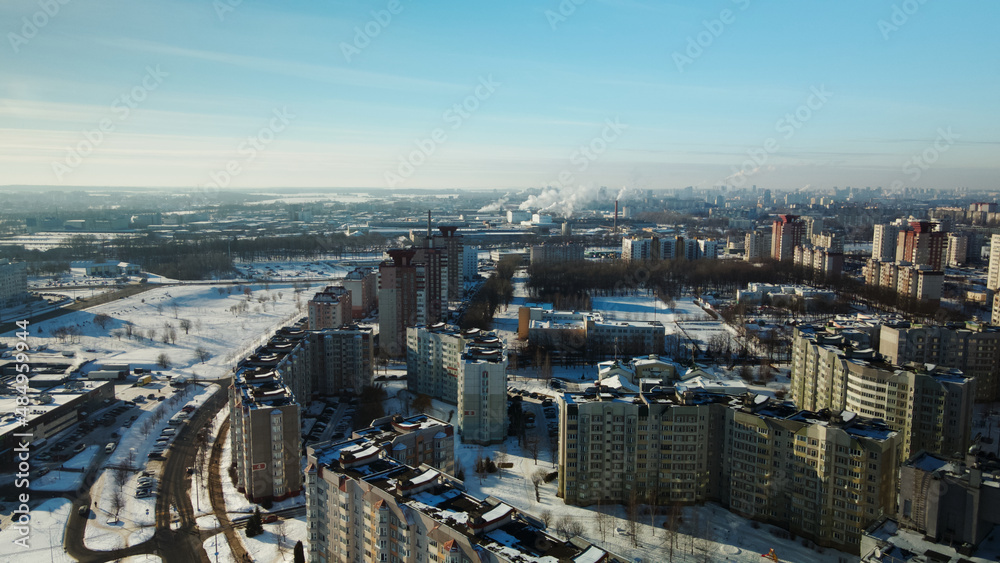 Fototapeta premium City block. Modern multi-storey buildings. Winter cityscape. Aerial photography.