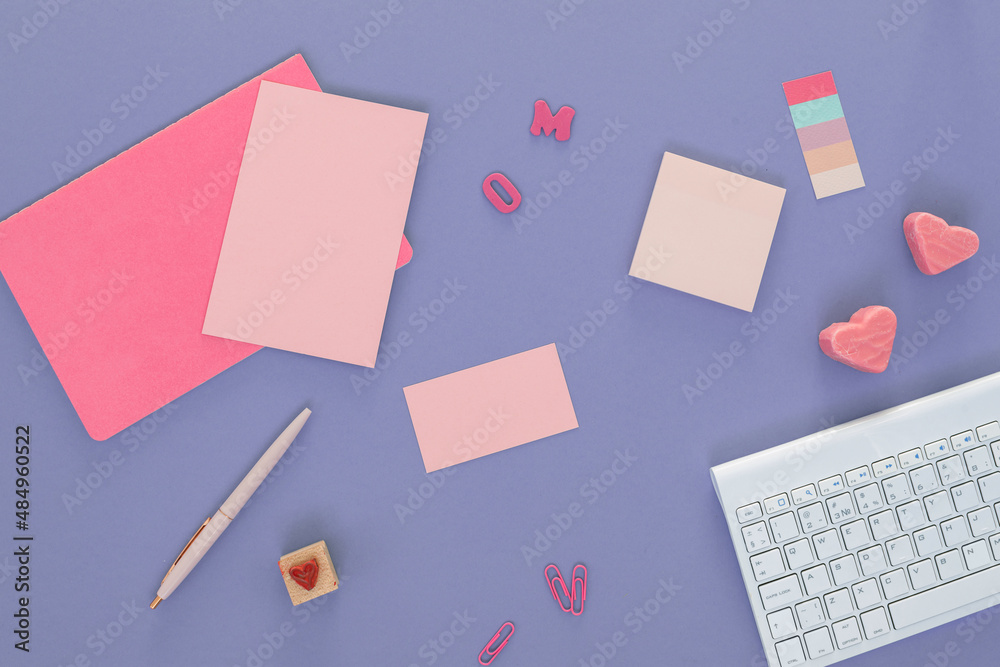 Office desk with keyboard, blank paper sheets, weekly planner, heart-shaped candies. Flat lay, top view minimalist blog hero header template. Valentine's day concept. Office desk with keyboard, blank paper sheets, weekly planner, heart-shaped candies. Flat lay, top view minimalist blog hero header template. Valentine's day concept.