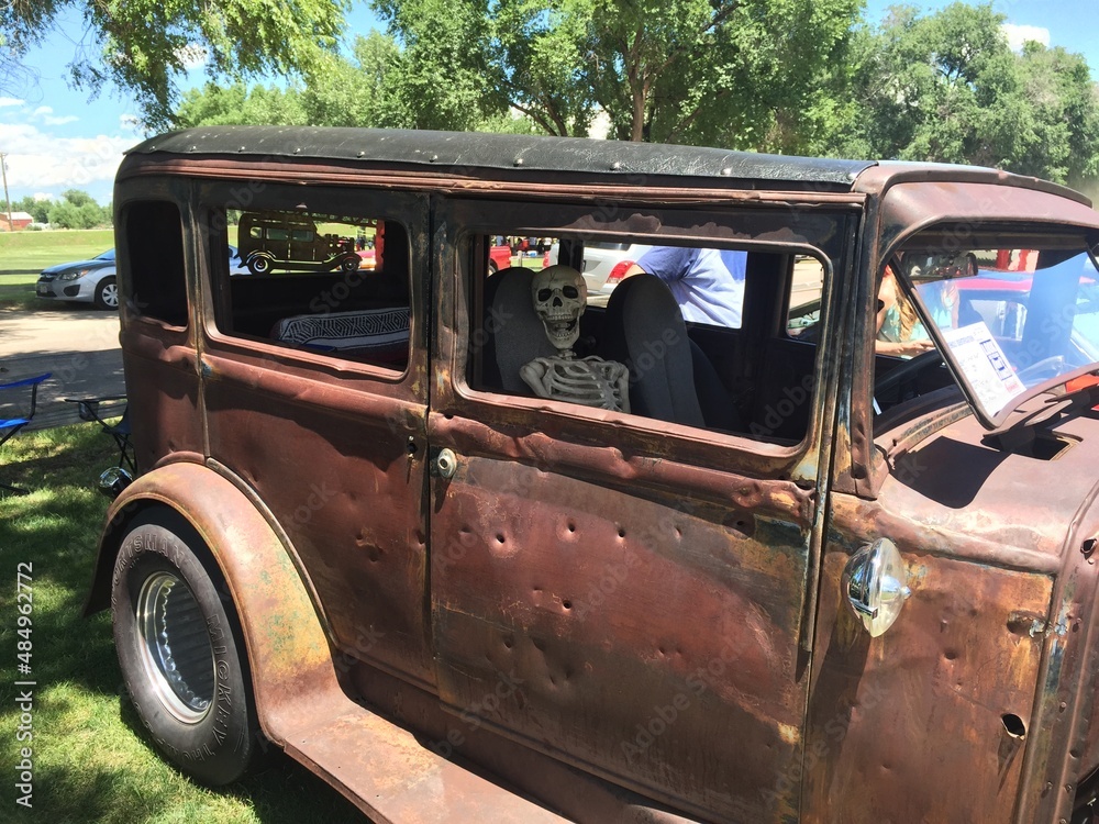 Skeleton on old Rusted Car at Colorado Festival Skeleton on old Rusted Car at Colorado Festival