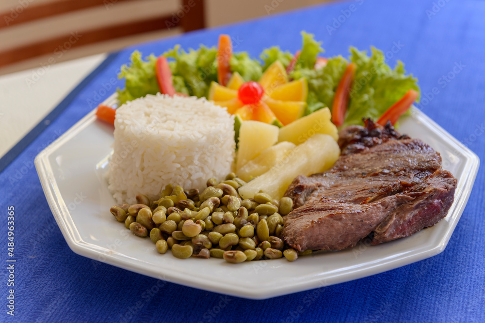 Healthy food. Sun meat with green beans, rice, cassava and salad. Northeastern Brazil food. Healthy food. Sun meat with green beans, rice, cassava and salad. Northeastern Brazil food.