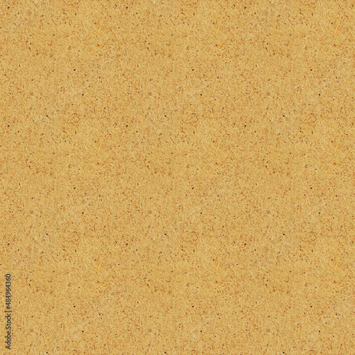 Craft paper texture, a sheet of seamless brown spotted craft paper texture as background