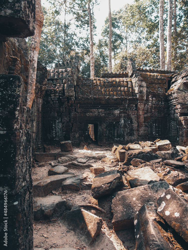 Ruins of an ancient stone temple lost in the Cambodian jungle - Ta Nei of Angkor temples Ruins of an ancient stone temple lost in the Cambodian jungle - Ta Nei of Angkor temples