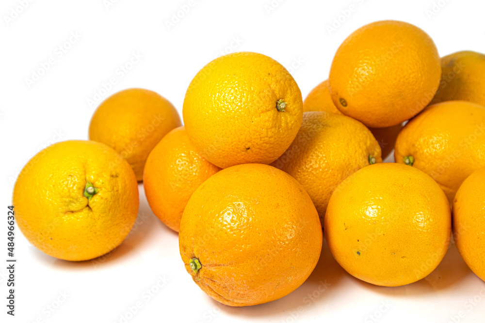 Stack of fresh oranges on white background. Healthy juicy oranges isolated. Stack of fresh oranges on white background. Healthy juicy oranges isolated.