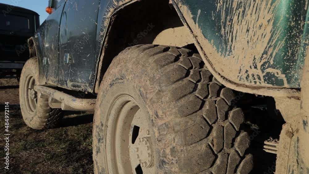 Dirty jeep wheels after a trip up the mountain Dirty jeep wheels after a trip up the mountain