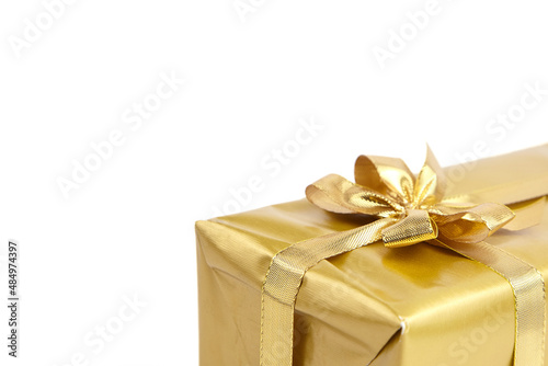 Gift box with golden bow isolated on white