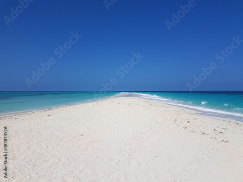 Beautiful Sand Island surrounded with an ocean in Zanzibar Tanzania 