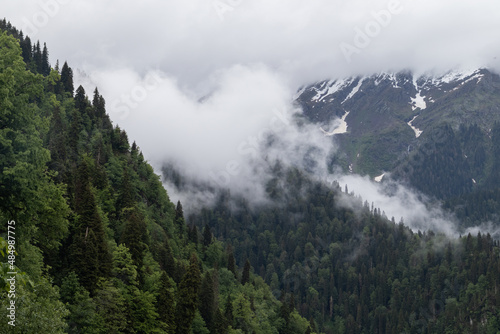 alpine mountains and clouds landscape background