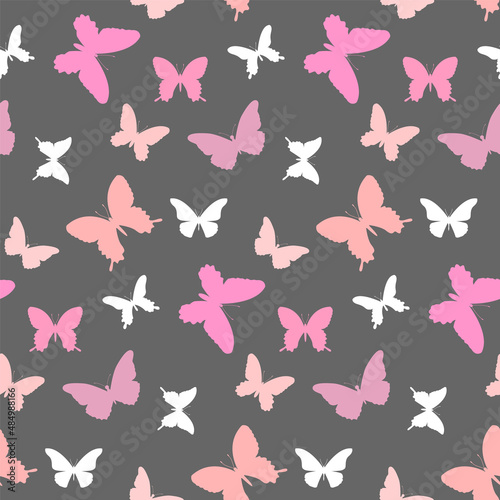 Butterfly pattern. Seamless background with pink and white butterflies on a gray background. Vector.