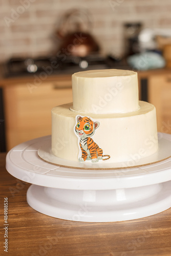 A cake decorated in the style of a tiger for a children's birthday